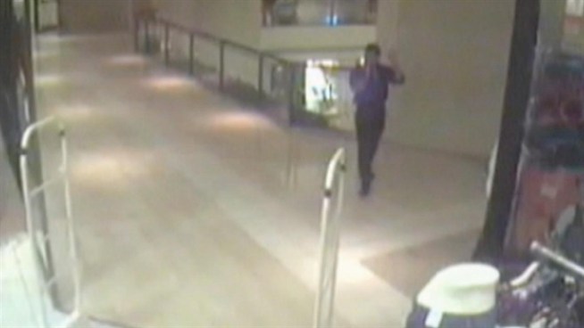 Authorities said they believe the woman in the video, wearing the white jacket and white hat, tried to rob another woman and ended up shooting her in the arm as she walked to her car near JC Penney of the Orland Square Mall shortly before 9 p.m. last Friday.