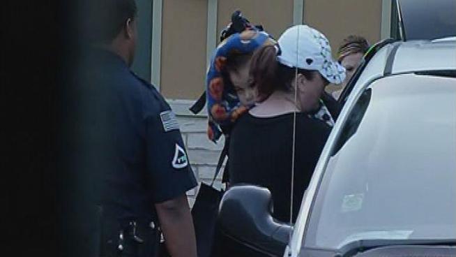 Porter Stone, 5, was seen being carried out of Ronald McDonald House in Oak Lawn Thursday by his mom Tiffany Stone. Porter was taken from St. Louis Children's Hospital on Tuesday by his father.