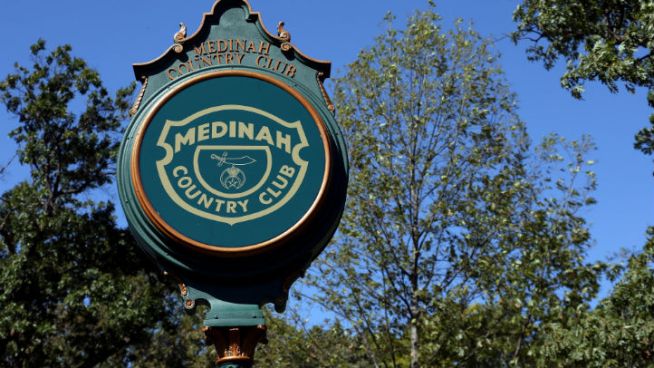 On Medinah's grounds Monday, the finishing touches were put on four months of work on a tent city around the clubhouse. Massive risers and grand stands cover the grounds, and impressive, temporary TV studios tower over the opening tee, where the biggest names in golf tee off Friday.