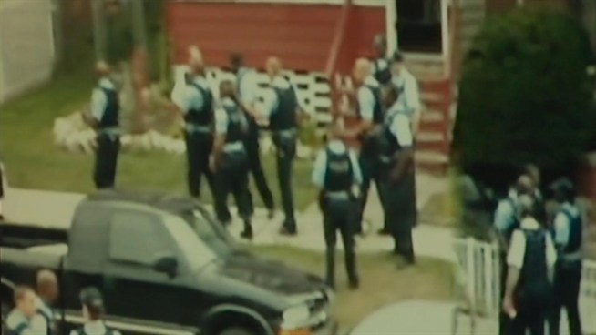 In a federal lawsuit, LaMonte Simmons says dozens of officers witnessed another officer attack him but failed to intervene. A neighbor captured video of the incident.