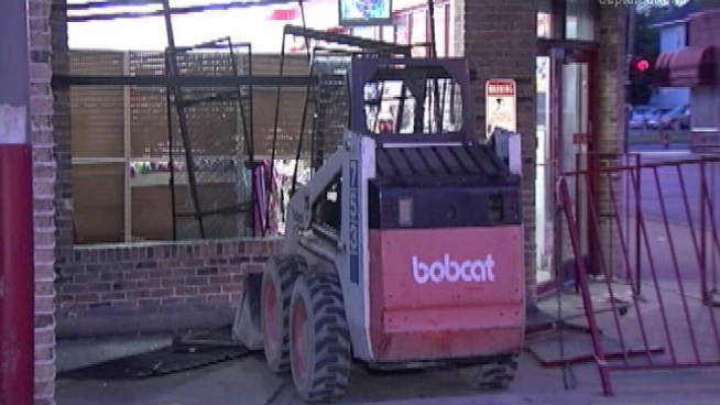 Chicago Police said someone stole a Bobcat tractor then drove it Friday morning through the gates of a Ravenswood Family Dollar.