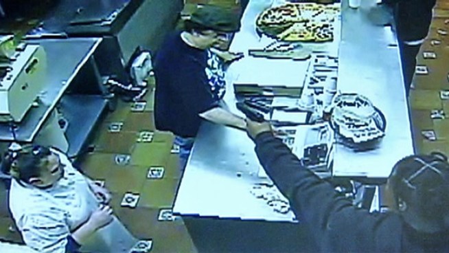 A newly-installed surveillance system recorded two men robbing a Ukranian Village pizzeria early Friday.