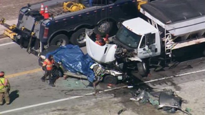 DeKalb County Sheriff's Department officials said the family's Mitsubishi Galant crossed the center line on Peace Road and slammed into a truck head-on. Rob Elgas reports.
