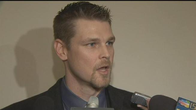 Kerry Wood wanted to stay with the Cubs. He lives in Chicago year-round, and the team's new management had made it clear that it wanted him back.