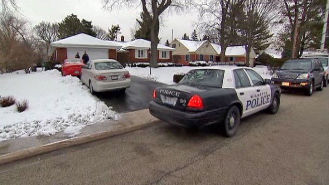 An 82-year-old north suburban woman was tied up in her home while being robbed at Thursday night, and police are looking for three people who forced there way in wearing masks.