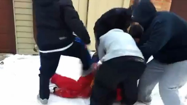 Warning: Video contains graphic violence. An attack on a teenager behind a CPS school was caught on tape and posted to YouTube.
