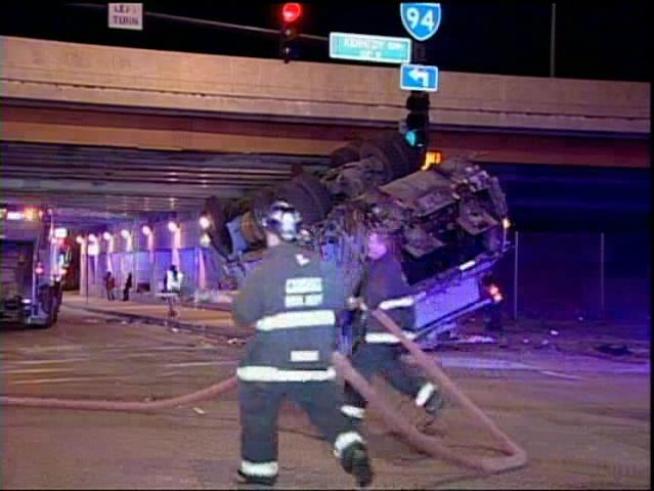 The trash truck flipped near the Kennedy Expressway.