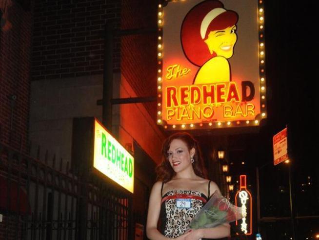 A bevy of redhead beauties vie for the chance to the real-life version of the iconic Redhead Piano Bar gal.