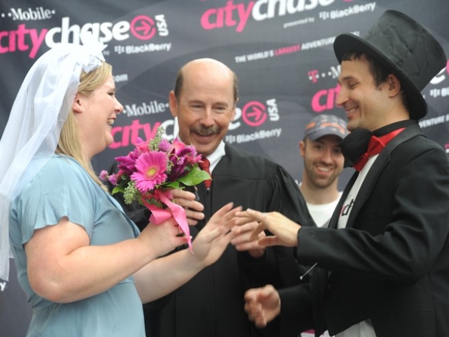 A bride surprises her groom with a City Chase wedding.