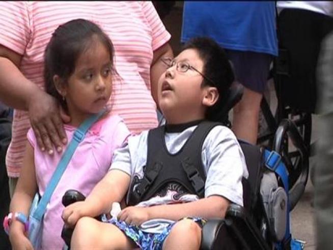 People with disabilities rally at Thopson Center in support of thousands of people who are forced to live segragated from the communities.