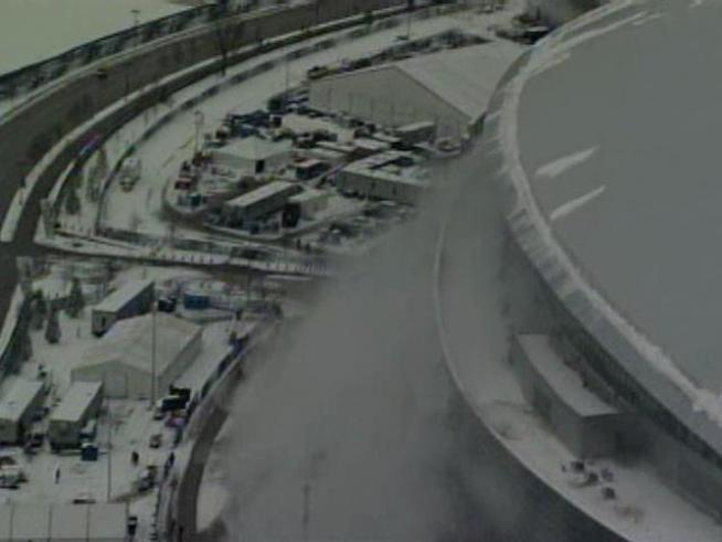 Five people injured due to ice falling from roof of <a title=