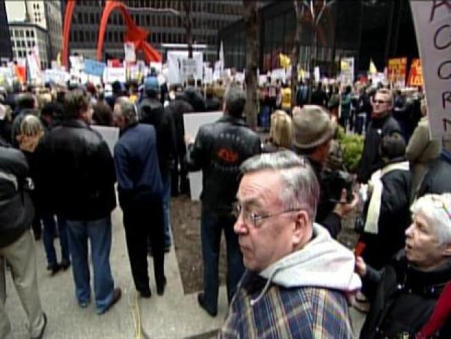 Hundreds of people have gathered in downtown Chicago to protest and rally against what they called excessive government spending.
