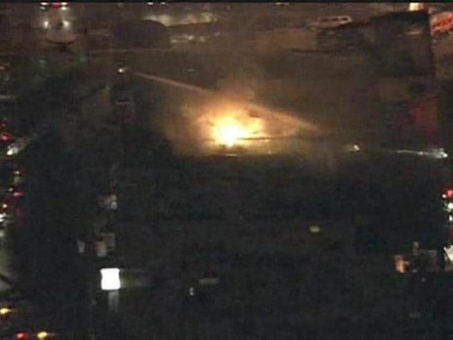 Trucks surround a Greektown block to prevent the Costas fire from spreading.