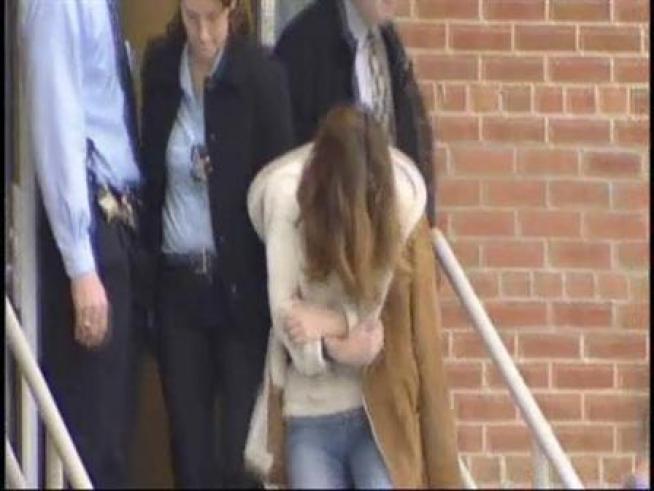 The woman accused of murdering Rhoni Reuter is seen the day after her arrest.