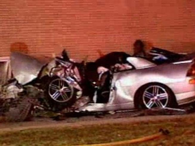 A violent crash into a building tore apart a car overnight, killing a 29-year-old man.