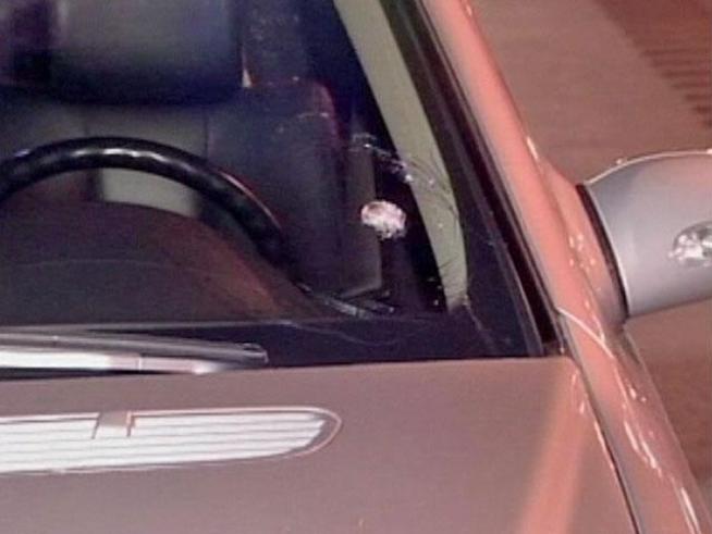 At least six cars, including an Illinois State Trooper's squad, were hit by rocks tossed onto the outbound Eden's Expressway early Friday morning.