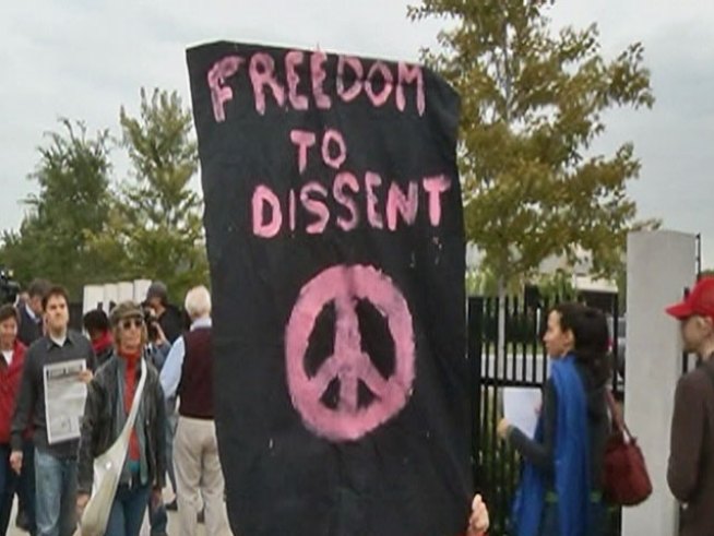 Protesters believe search warrants executed last week on homes in <a title=