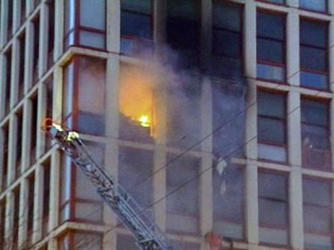 A fire breaks out in a 15-story high-rise near Erie and the Kennedy, prompting a big response from the Fire Department and causing delays on the expressway.
