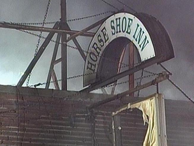 A body found inside a northwest suburban pub as firefighters battled a three-alarm fire early Thursday morning has sparked an investigation by police and the state Fire Marshal's office.