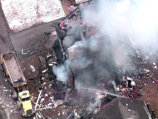 A home on Bailey Road in far south suburban Park Forest exploded Tuesday afternoon, shaking the neighborhood and sending a thick plume of black smoke skyward.