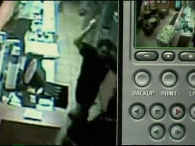 Prior to stealing a taxi and crashing into a pole, a man tried to rob a <a title=
