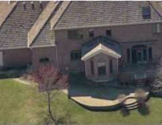 Sugar Grove police say a man settled into a vacant $700.000 mansion for eight months.