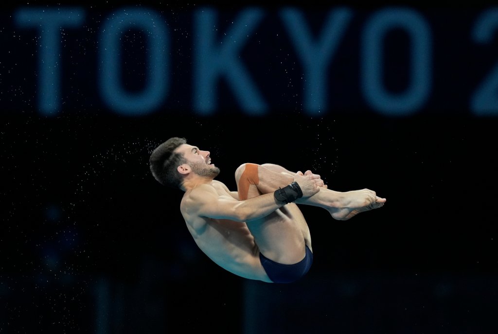 Brandon Loschiavo of Team United States competes in Men's Diving 10-Meter Platform semifinal at the Tokyo Aquatics Centre at the 2020 Olympics, Saturday, Aug. 7, 2021, in Tokyo, Japan.