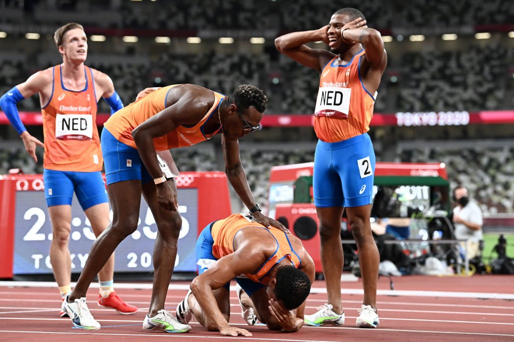 Netherlands' team react after taking second place in the men's 4x400m relay final during the Tokyo 2020 Olympic Games at the Olympic Stadium in Tokyo on Aug. 7, 2021.
