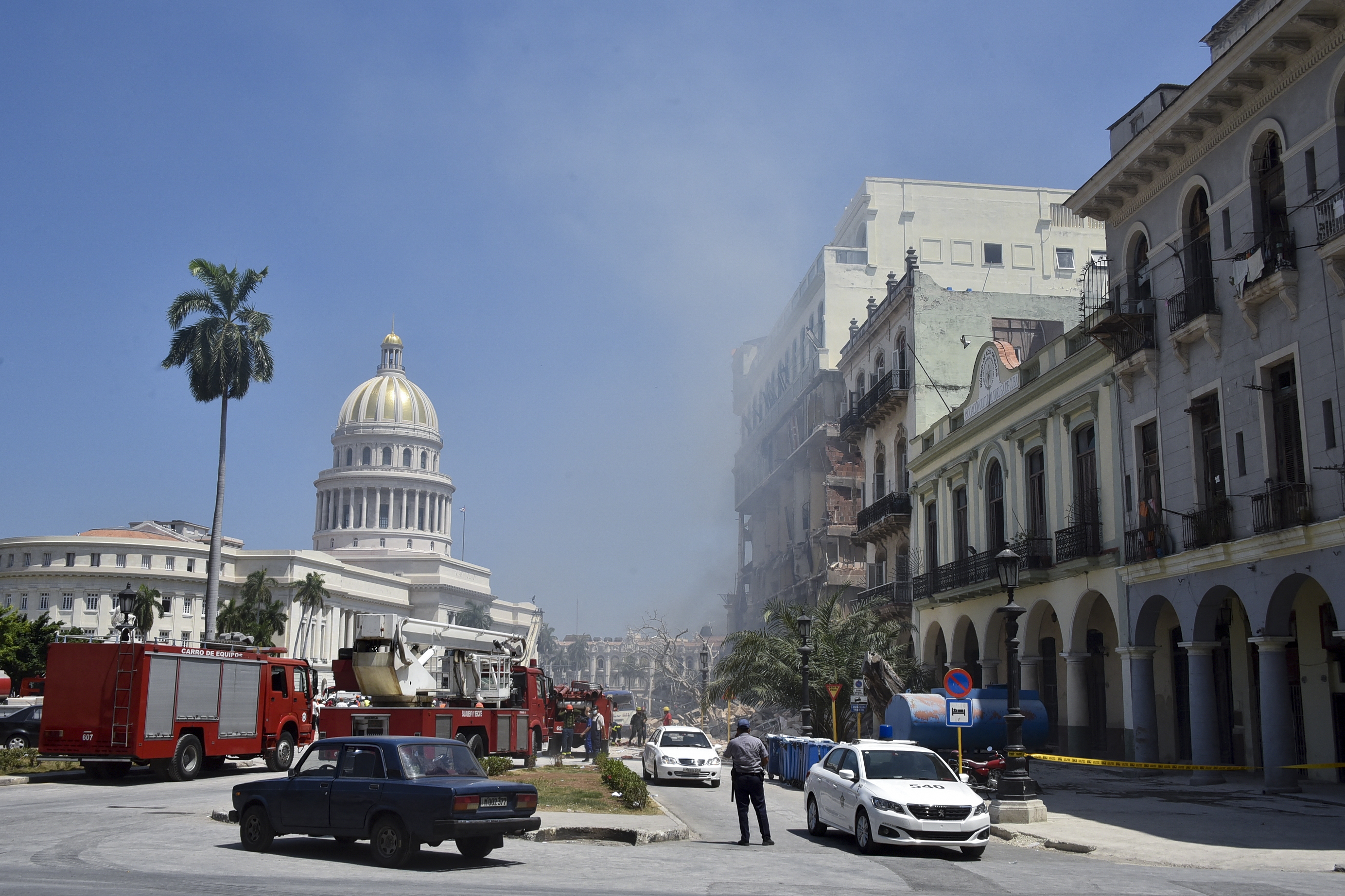 Rescuers work after an explosion in the Saratoga Hotel in Havana, on May 6, 2022. A powerful explosion destroyed part of a hotel under repair in Cuba's capital.