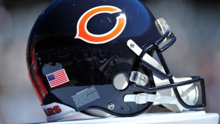 A Bears helmet sits on the sidelines during a Bears game at Soldier Field