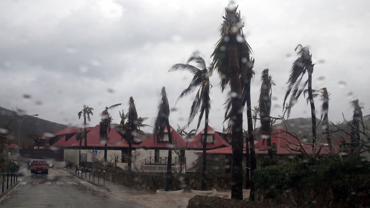 Rain brought by approaching Hurricane Maria falls in Saint Jean Bay, St. Barthelemy, part of the French Antilles, Tuesday, Sept. 19, 2017. Hurricane Maria is passing far south of St. Barthelemy on Tuesday and charging into the eastern Caribbean that threatens islands already devastated by Hurricane Irma.