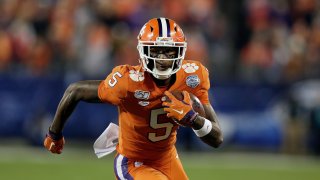 Clemson wide receiver Tee Higgins runs against Virginia during the first half of the Atlantic Coast Conference championship NCAA college football game in Charlotte, N.C., Saturday, Dec. 7, 2019.