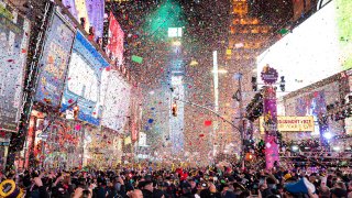 In this Jan. 1, 2020, file photo, confetti falls at midnight on the Times Square New Year's Eve celebration in New York.