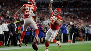 Kansas City Chiefs' Travis Kelce (87) celebrates his touchdown with Kansas City Chiefs' Damien Williams during the second half of the NFL Super Bowl 54 football game against the San Francisco 49ers, Sunday, Feb. 2, 2020, in Miami Gardens, Florida.