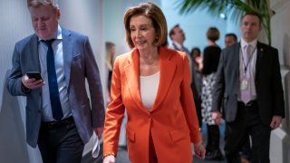 House Speaker Nancy Pelosi, D-Calif., arrives for a meeting with fellow Democrats on Capitol Hill in Washington, Feb. 26, 2020.