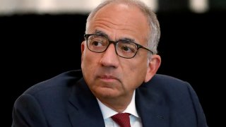 FILE - In this Dec. 6, 2019, file photo, U.S. Soccer President Carlos Cordeiro presides over a meeting of the U.S. Soccer Board of Directors in Chicago.