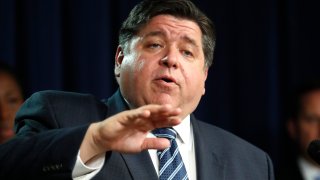 Illinois Gov. J.B. Pritzker responds to a question after announcing that three more people have died in the state from from Covid-19 virus, two Illinois residents and one woman visiting from Florida, during a news conference Thursday, March 19, 2020, in Chicago.