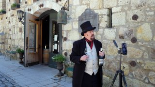 George Webber, dressed as "The Count" Agoston Haraszthy, leads a virtual online tasting and tour of the historic Buena Vista Winery in Sonoma, Calif.