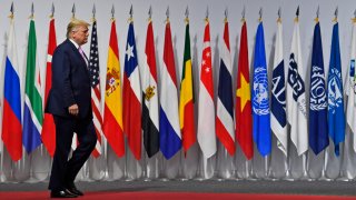 President Donald Trump arrives to greet Japanese Prime Minister Shinzo Abe