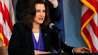 This photo provided by the Michigan Office of the Governor, Michigan Gov. Gretchen Whitmer addresses the state during a speech in Lansing, Mich., Friday, April 17, 2020.