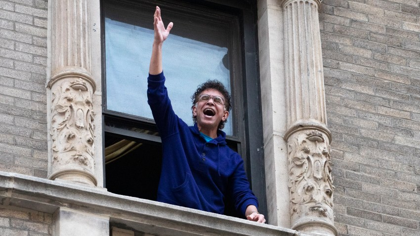 Brian Stokes Mitchell sings from his window