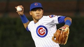 Addison Russell throws from shortstop in a game at Chicago's Wrigley Field.