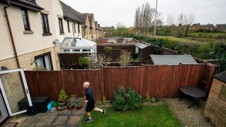James Campbell runs a charity marathon to raise funds for the NHS, in his garden, while the country is in lockdown to control the spread of coronavirus, in Cheltenham, England, April 1, 2020.