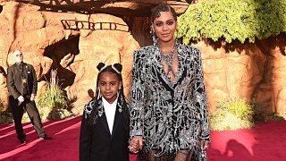 Blue Ivy Carter (L) and Beyonce Knowles-Carter attend the World Premiere of Disney's "The Lion King" at the Dolby Theatre, July 9, 2019, in Hollywood, Calif.
