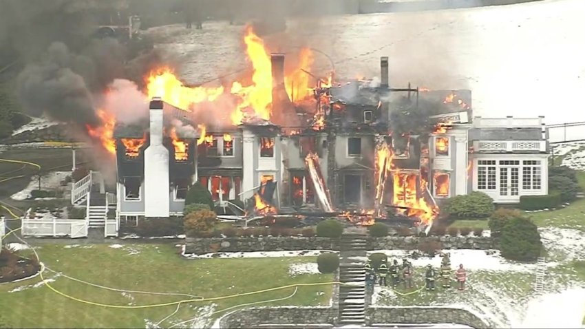 Raw Video: Flames Consume Mass. Mansion