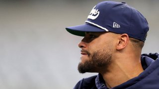 Dak Prescott #4 of the Dallas Cowboys warms up before the game against the Washington Redskins at AT&T Stadium on December 29, 2019 in Arlington, Texas.