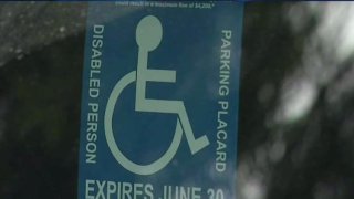 Disabled_Parking_Placards_Illegally_Used_by_City_Workers.jpg
