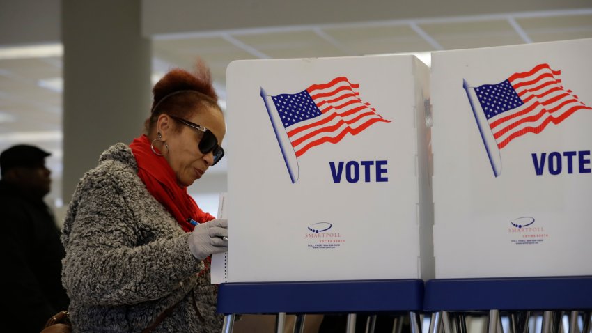 Andrea Anthory takes advantage of early voting, Friday, March 13, 2020, in Cleveland.