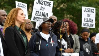 In this Oct. 1, 2019, file photo, Sheneen McClain, center, mother of Elijah McClain, speaks during a press conference in front of the Aurora Municipal Center.