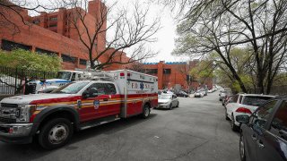 Ambulances are seen by Lincoln Hospital in the Bronx borough of New York City, April 20, 2020.